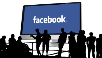 Image containging a billboard with the word "facebook"